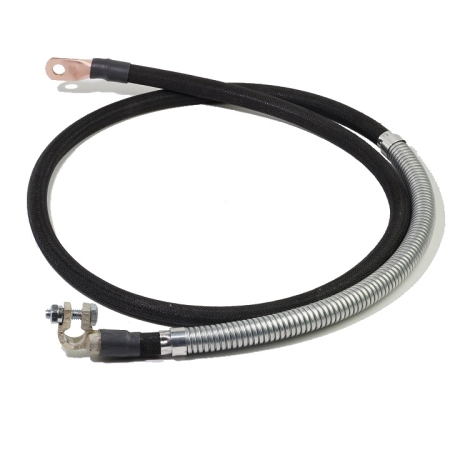 A black cotton-braid battery cable with a right-angle battery terminal on one end and a straight lug on the other. Part of the cable near the battery terminal is armored.