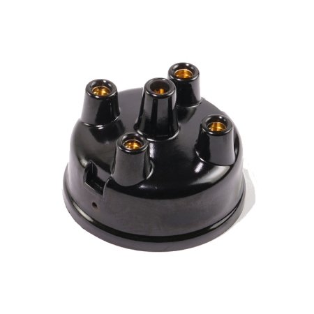 A 4-cylinder distributor cap with 4 ports in a square and a taller port in the center of it. The cap itself is round.
