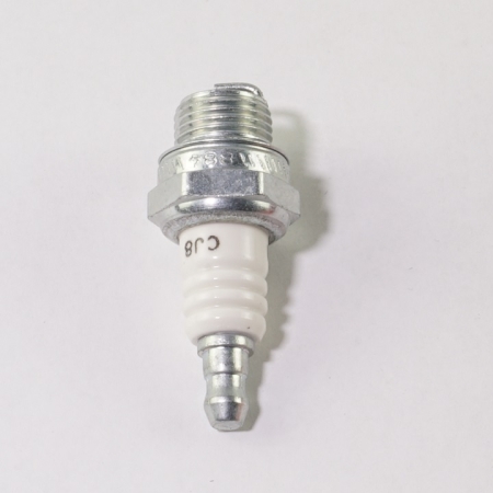 Spark plug against white background, stamped"CJ8"