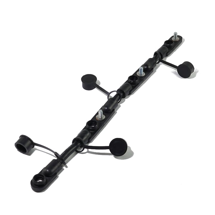 Black overmolded 2/0 gauge battery cable harness with mounting studs and protective rubber caps.