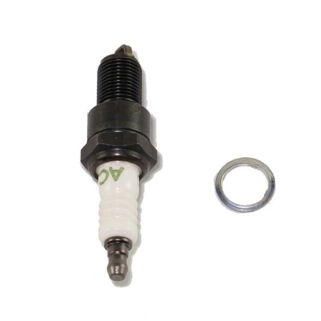 A black and white spark plug lying on its side with a white background