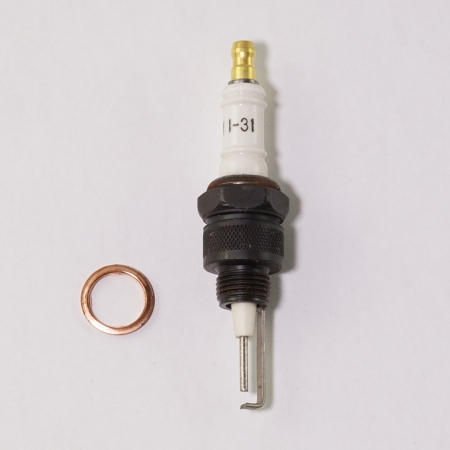 Spark plug and ring against white background