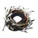 A nest of labeled wires, mostly black.
