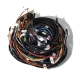 A coiled nest of numbered colorful wires against a white background