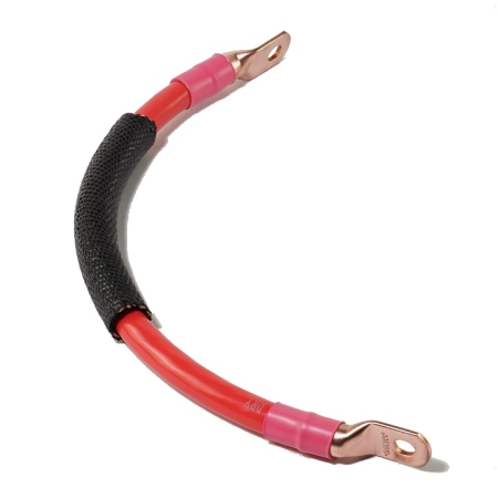 A red cable with lugs on both ends, and black loom around the center.