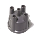A gray 4-cylinder distributor cap against a white background.